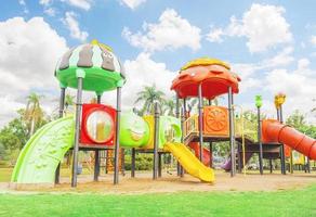 Colorful playground with blue sky background photo