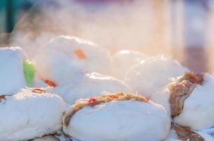 Soft focused of steamed pork bun, Thai style photo