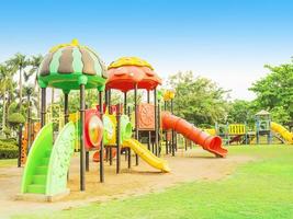 Colorful playground with blue sky background photo