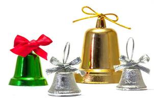 Green silver and gold bells with red silver and gold bow for Christmas and New year decoration isolated over white photo