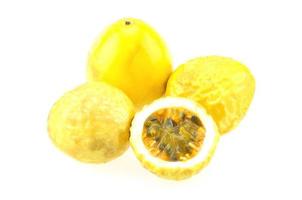 Ripe passion fruit isolated over white background photo