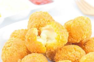 Fried cheese ball with potato and mustard  sauce photo