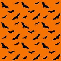 Seamless pattern with bats on an orange background. The background. Print design for textile production. Vector illustration