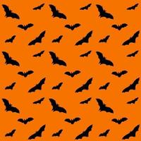 Seamless pattern with bats on an orange background. The background. Print design for textile production. Vector illustration