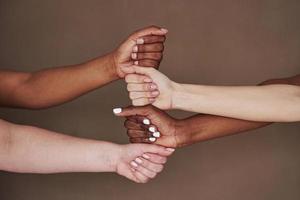 Side view of women's hands in gesture. Conception of success photo