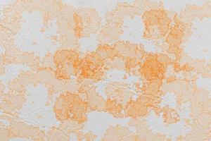 Orange abstract background look like point or lslet on leather or paper texture photo