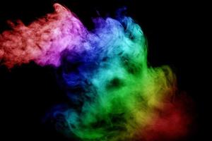 Abstract smoke isolated on black background,Rainbow powder photo