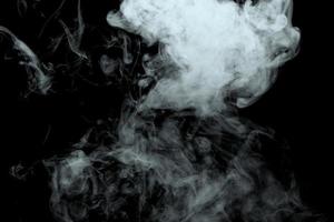 Abstract powder or smoke effect isolated on black background,Out of focus photo