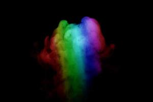 Abstract smoke isolated on black background,Rainbow powder photo