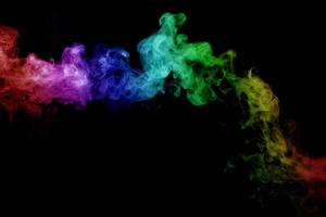 Abstract smoke isolated on black background,Rainbow powder photo