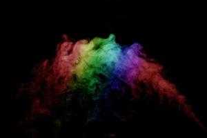 Abstract smoke isolated on black background,Rainbow powder photo