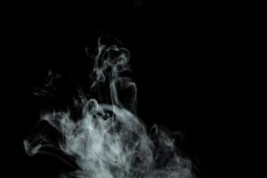 Abstract powder or smoke effect isolated on black background,Out of focus photo