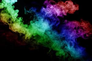 Abstract smoke isolated on black background,Rainbow powder photo