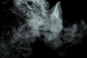 polvo abstracto o efecto de humo aislado sobre fondo negro foto