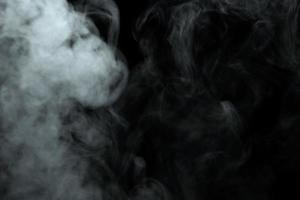 Abstract powder or smoke effect isolated on black background,Out of focus photo