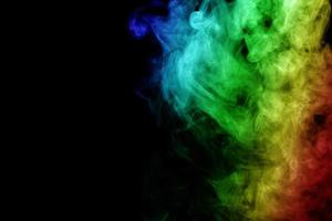 Abstract smoke isolated on black background,Rainbow powder photo