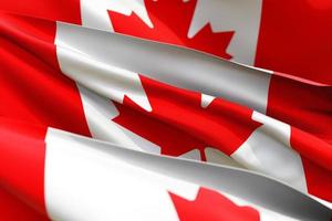 The national flag of  Canada from textiles close up in three versions, soft focus photo