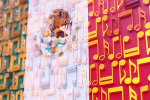 Musical notes lined up in even rows against the backdrop of the National Flag of  Mexico . The concept of the national anthem, music. 3D illustration photo