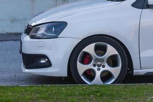 Manavgat  Turkey March 05  , 2022 white Volkswagen Polo , wheel, bumper and hood photo