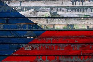 The national flag of Czech  is painted on uneven boards. Country symbol. photo