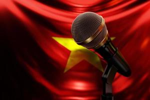 Microphone on the background of the National Flag of Vietnam, realistic 3d illustration. music award, karaoke, radio and recording studio sound equipment photo