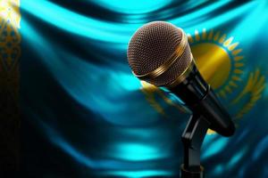 Microphone on the background of the National Flag of Kazakhstan, realistic 3d illustration. music award, karaoke, radio and recording studio sound equipment photo