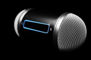 3d illustration close up of a metal microphone on a black background photo