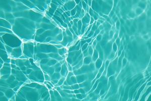 desenfoque de agua borrosa en la piscina fondo de detalle de agua ondulada foto