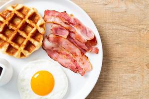 fried egg with bacon and waffle photo