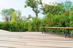 empty bench on balcony with tree background photo