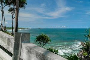 Natural view of the coast in Indonesia when the weather is sunny. Karang Tawulan beach tourism in Indonesia photo