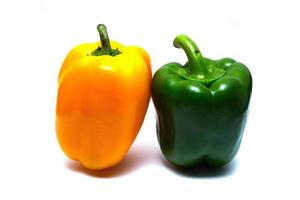 Yellow and green sweet pepper isolated on a white background photo