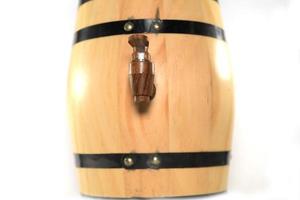 Wooden cork-plastic-on light brown oak barrels-beer-whiskey-small on a white background and a small family. photo