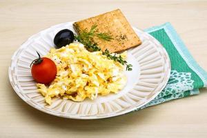 Scrambled eggs with tomato photo