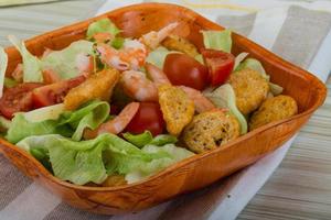 Caesar salad with shrimps photo