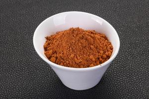 Cocoa powder in the bowl photo