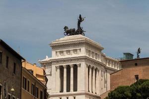 Equestrian monument to Victor Emmanuel II near Vittoriano at day in Rome, Italy photo