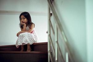 Sad child from this father and mother arguing, family negative concept.vintage color photo