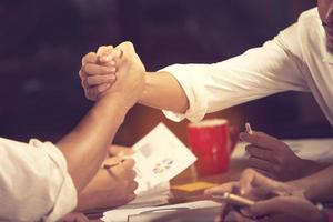 Business people shaking hands, finishing up a meeting Handshake Business concept.vintage color photo