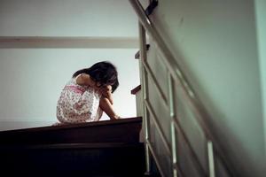 Sad child from this father and mother arguing, family negative concept.vintage color photo