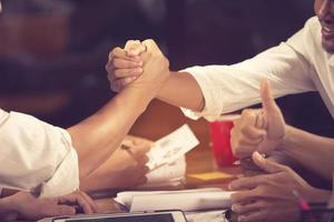 Business people shaking hands, finishing up a meeting Handshake Business concept.vintage color photo