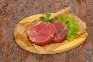 Raw tuna round steak for grill photo