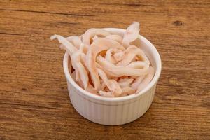 Marinated squid slices in the bowl photo