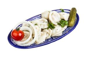 Bowl with traditional russian dish - pelmeni photo