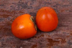 Sweet tasty persimmon photo