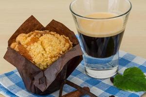 Muffin with espresso photo