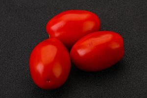 Red bright tasty tomato heap photo
