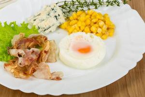Breakfast with egg and bacon photo
