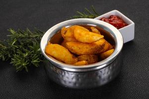 Fried potato slices photo