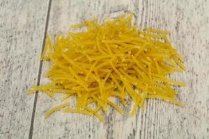 Dry raw vermicelli Italian pasta photo